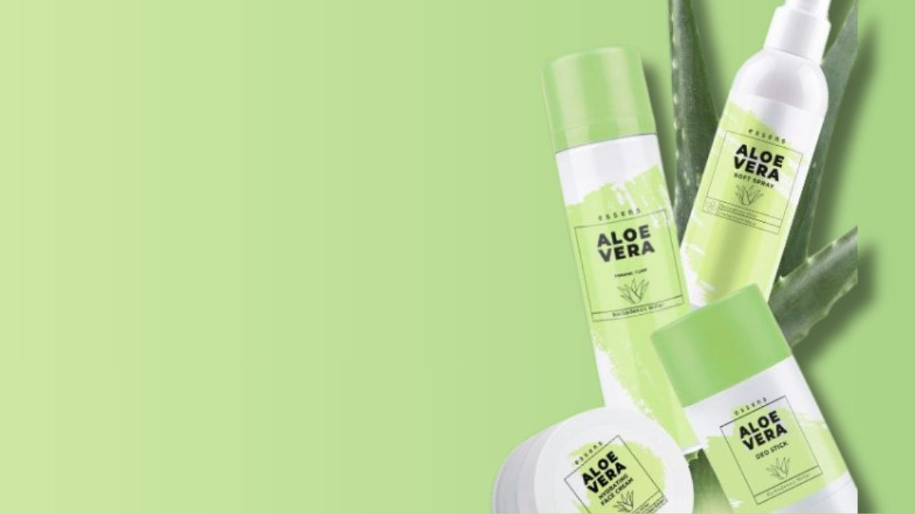 Aloe vera products including bottles and a gel on a green background